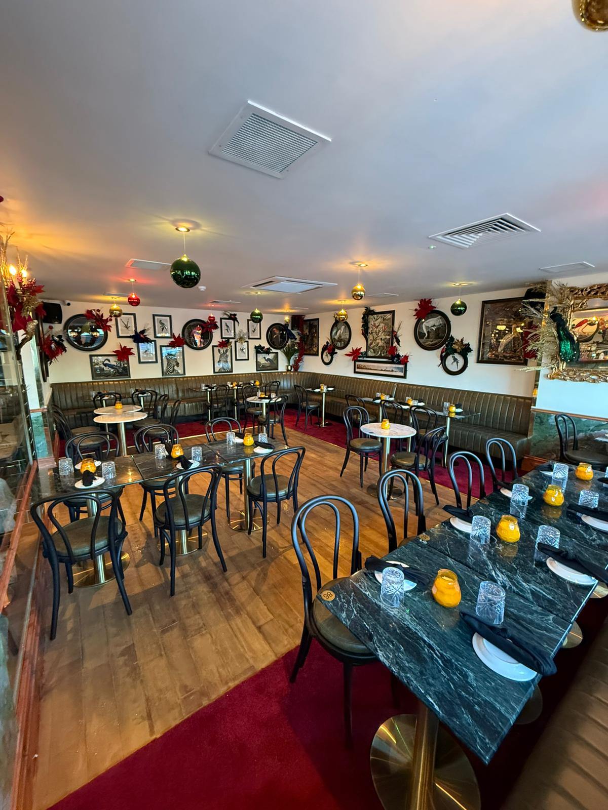 Booth seating by the cocktail bar at Boeuf & Frites Blanchardstown